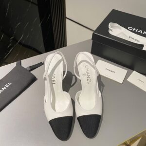 CHANEL Two-Tone cap toe slingback pumps